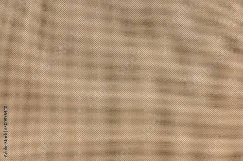 Beige abstract textured background. Perpendicularly intersecting plastic threads