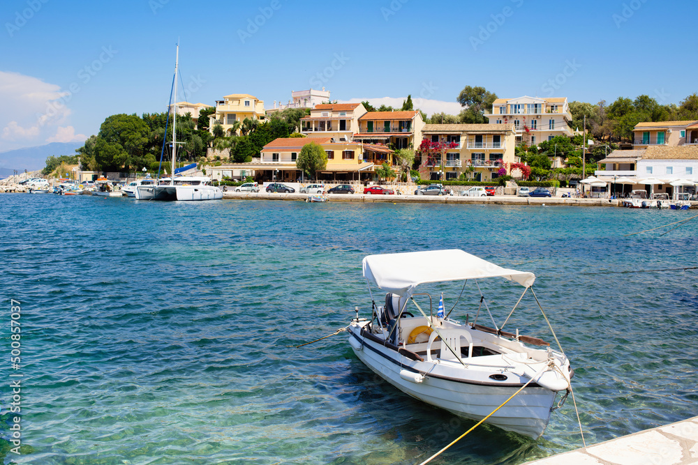 Corfu island, Greece, Beautiful bay with boats in Kassiopi village 