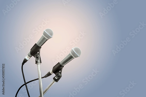 two microphone blue background