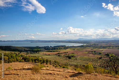 Trasimeno Lake and landscape on sunny day, Castiglione del Lago, Umbria, Italy