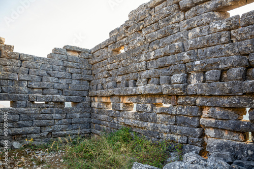 Ruined walls at ancient archaeological site of Orraon, Arta, Greece photo