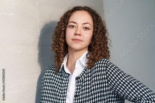 Beautiful woman with brown curly hair