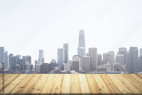 Wooden tabletop with beautiful San Francisco buildings on background  mock up