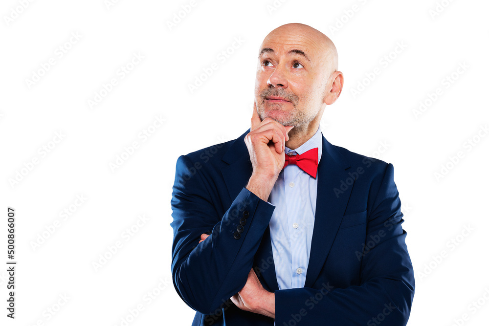 Studio portrait of middle aged man wearing suit and bow tie while standing at isolated white background Studio portrait of middle aged man wearing suit and bow tie while standing at isolated white background