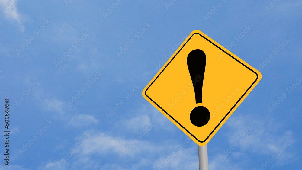 Exclamation Mark Road Sign on Clear Blue Sky with Rapid Moving Clouds for Text Placement Exclamation Mark Road Sign on Clear Blue Sky with Rapid Moving Clouds for Text Placement