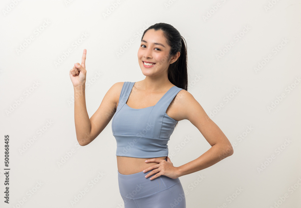 Young beautiful asian woman with sportswear on isolated white background. Portrait sporty woman standing pose exercise workout in studio. Young beautiful asian woman with sportswear on isolated white background. Portrait sporty woman standing pose exercise workout in studio.