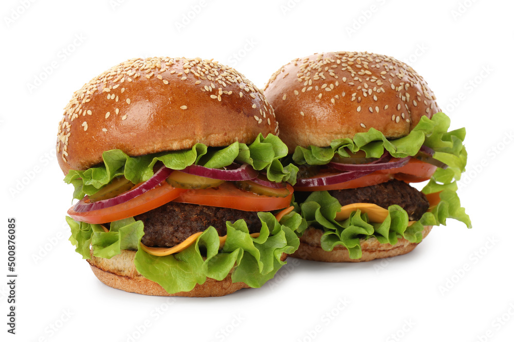 Yummy burgers with patties, cheese, fresh vegetables on white background. Fast food Yummy burgers with patties, cheese, fresh vegetables on white background. Fast food