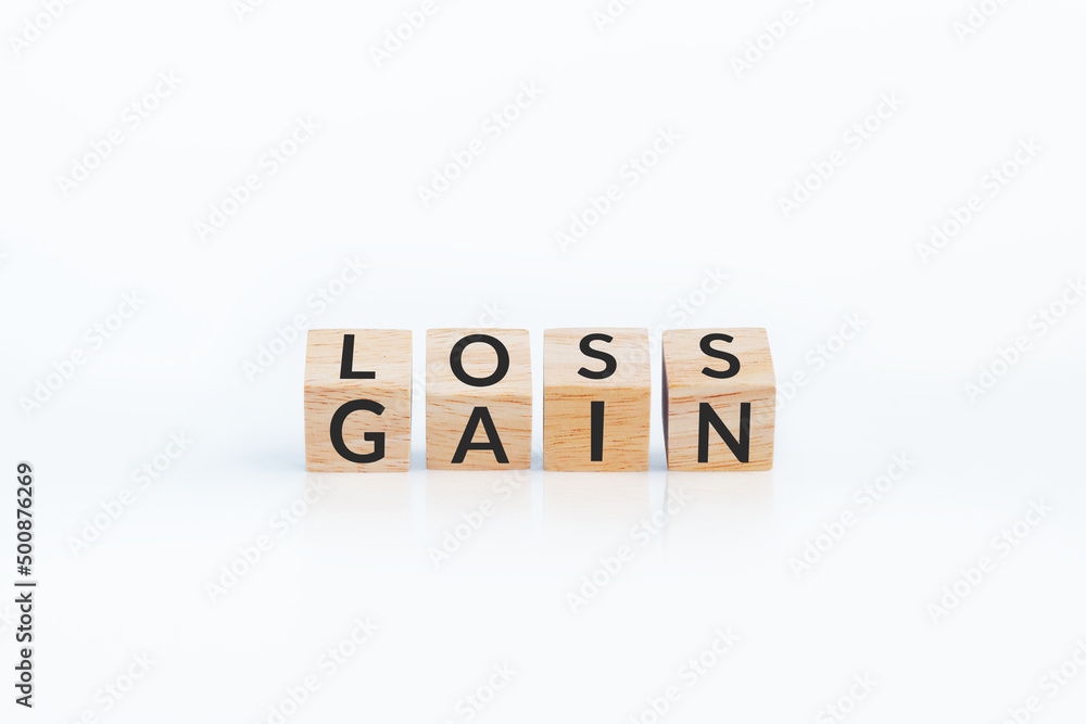 turn loss into gain concept, wooden cube with word LOSS flip to GAIN. capital investment gain and loss, financial while managing assets e.g. bonds, stocks, derivatives, ETFs, Crypto currency, forex turn loss into gain concept, wooden cube with word LOSS flip to GAIN. capital investment gain and loss, financial while managing assets e.g. bonds, stocks, derivatives, ETFs, Crypto currency, forex