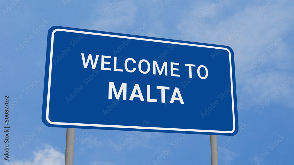 Welcome to Malta Road Sign on Clear Blue Sky Welcome to Malta Road Sign on Clear Blue Sky