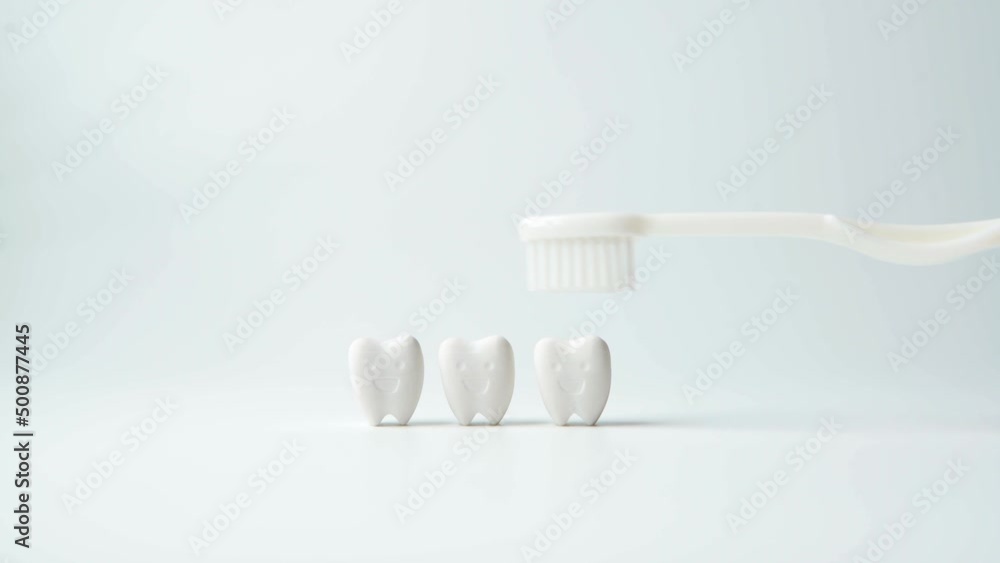 Healthy and whiteness tooth on white background with step cleaning and check tooth, brushing with toothbrush, flossing and checking by mouth mirror on white background Healthy and whiteness tooth on white background with step cleaning and check tooth, brushing with toothbrush, flossing and checking by mouth mirror on white background