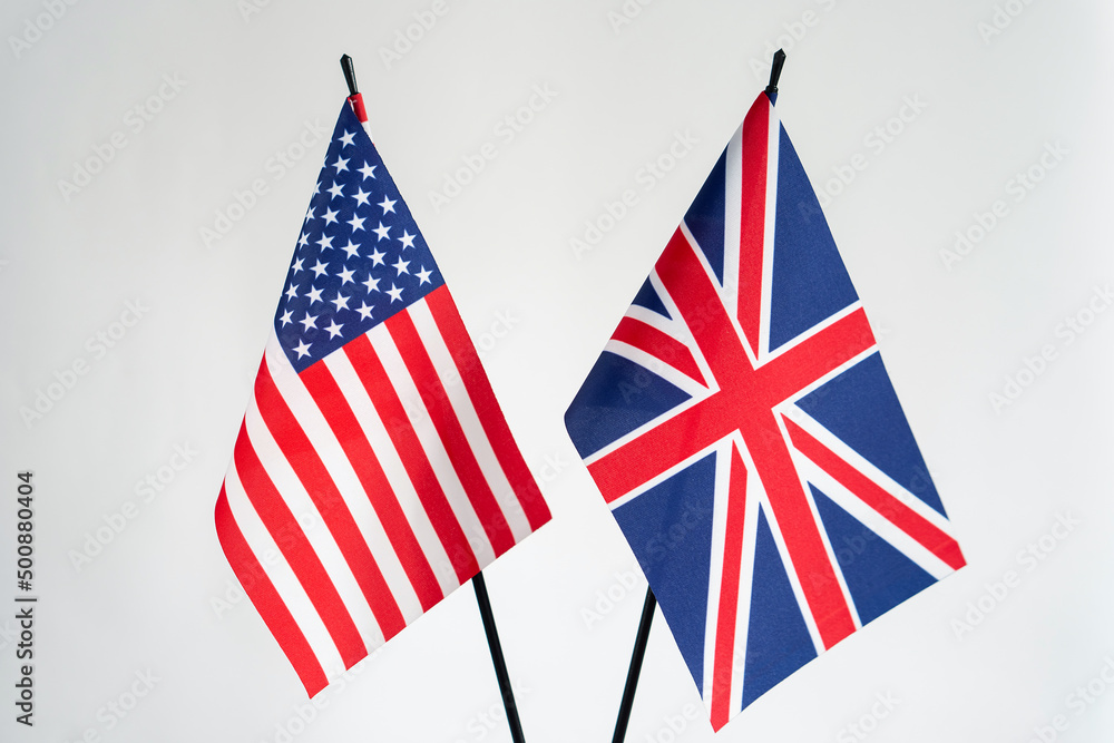 State flags of United States of America and United Kingdom on white background. USA and UK flags