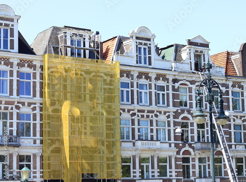 Photography Amsterdam Amsteldijk Street Traditional Brick House Facades with Scaffold and Ye