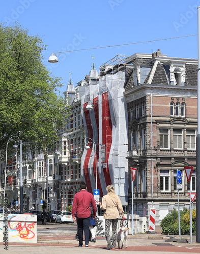 Photography Amsterdam Weesperzijde Street View with Couple Walking the Dog, Netherlands
