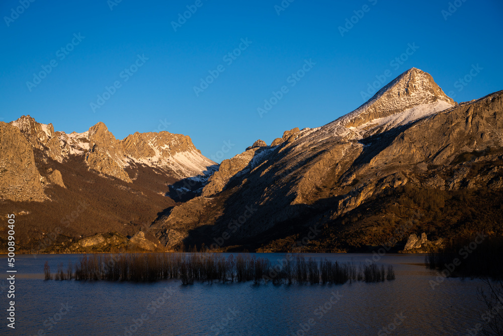 Sunrise over mountains at Riaño reservoir in Spain Sunrise over mountains at Riaño reservoir in Spain