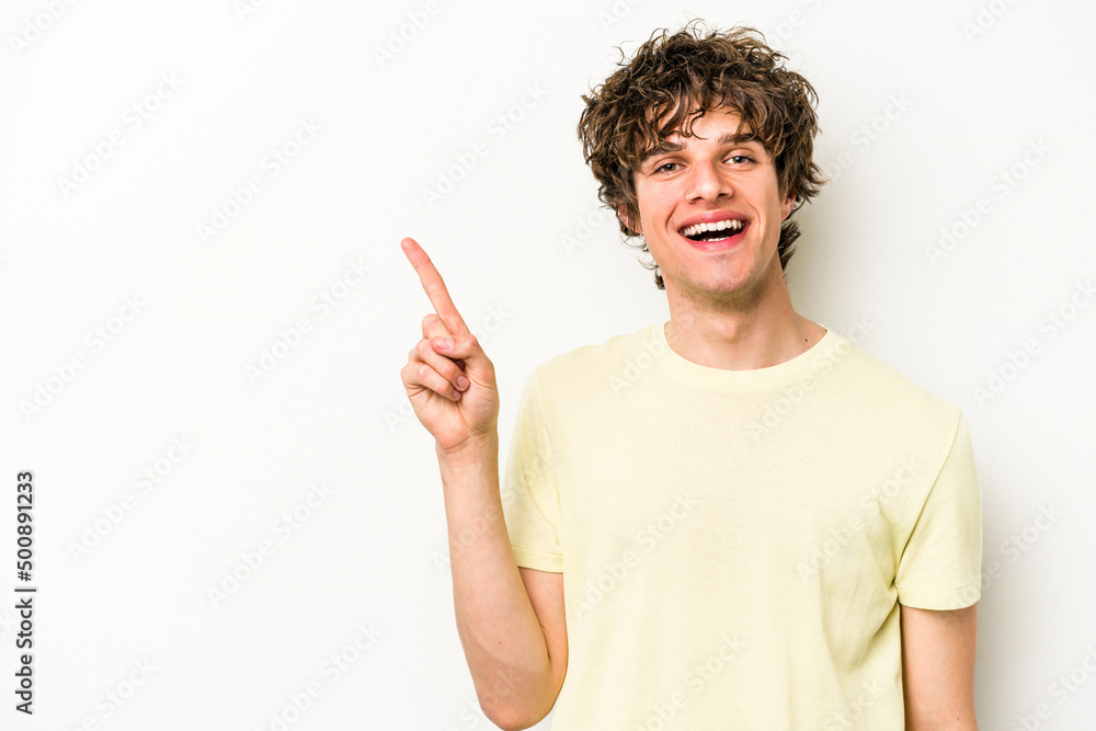 Young caucasian man isolated on white background showing number one with finger. Young caucasian man isolated on white background showing number one with finger.