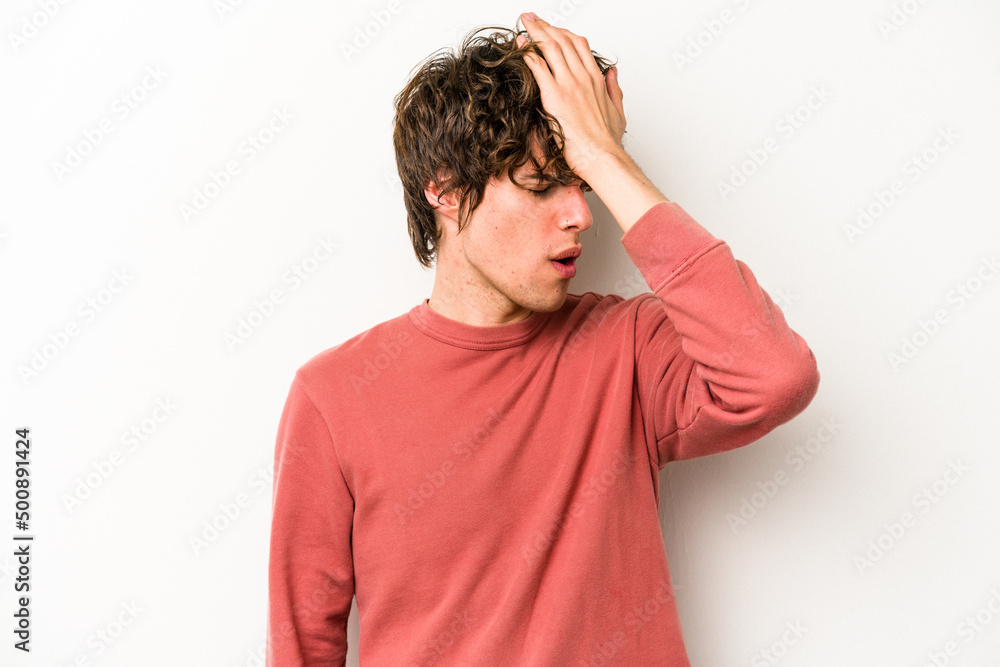 Young caucasian man isolated on white background forgetting something, slapping forehead with palm and closing eyes. Young caucasian man isolated on white background forgetting something, slapping forehead with palm and closing eyes.