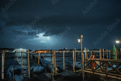 Grand Canal of the People on a background of lightning in Venice, Italy