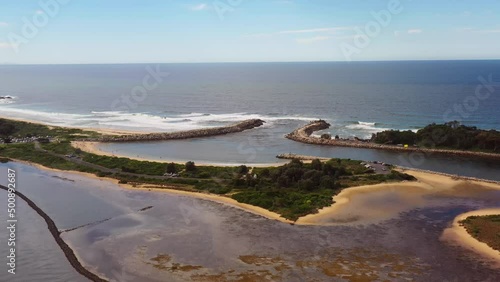 Breakwall at the entrance to Wagonga inlet of Narooma town in Australia 4k.
 photo