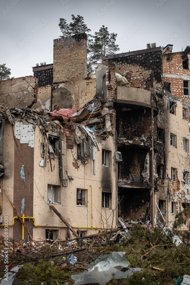 Irpin, Kyev region Ukraine - 09.04.2022: Cities of Ukraine after the Russian occupation. Destroyed buildings on the streets of Irpen. Broken, shelled windows. Buildings after being hit by missiles. Irpin, Kyev region Ukraine - 09.04.2022: Cities of Ukraine after the Russian occupation. Destroyed buildings on the streets of Irpen. Broken, shelled windows. Buildings after being hit by missiles.