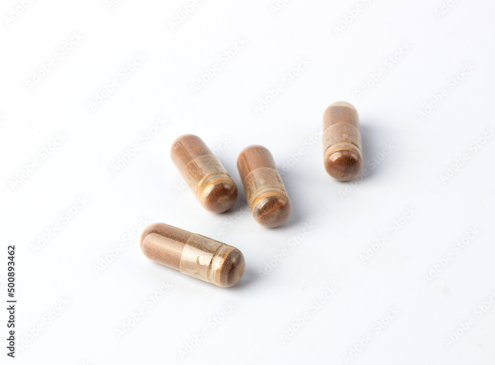 Grape Extract powder capsule on white background