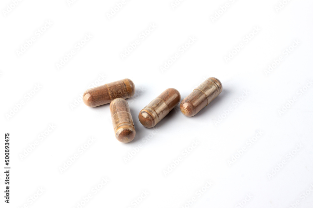 Grape Extract powder capsule on white background