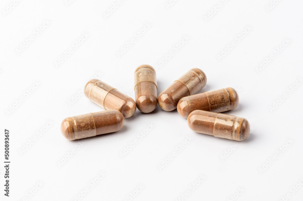 Grape Extract powder capsule on white background