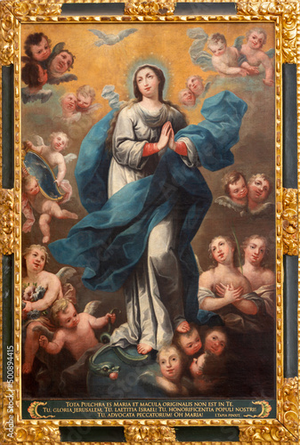 VALENCIA, SPAIN - FEBRUAR 17, 2022: The painting of Immaculate Conception in the church Iglesia de San Marín by Isidoro Tapia (1712 - 1778). photo