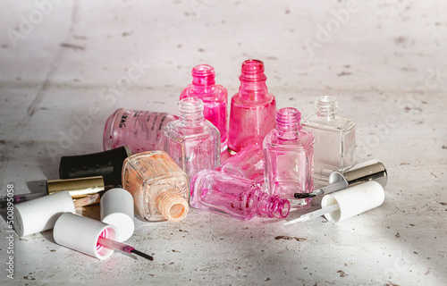 Empty nail polish bottles ready for recycling and nature protection