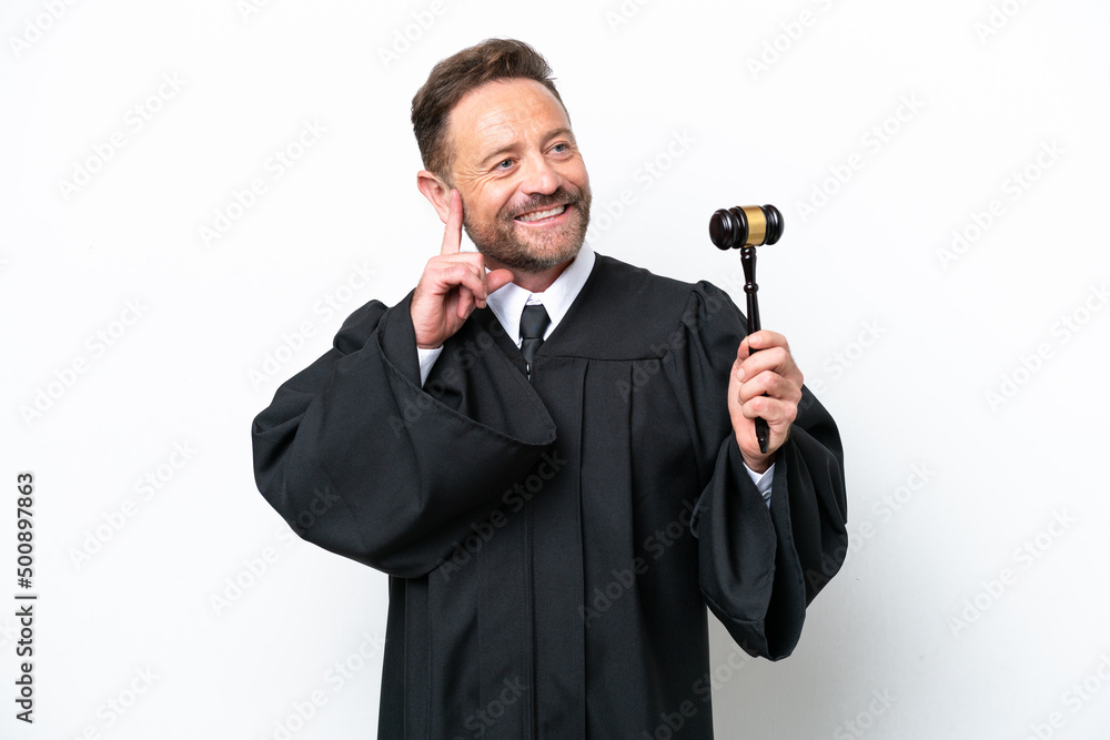 Middle age judge man isolated on white background thinking an idea while looking up Middle age judge man isolated on white background thinking an idea while looking up