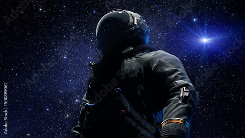Astronaut in spacesuit helmet is a reflection of stars and galaxies. Space exploration, an astronaut looks up into space. 3d render