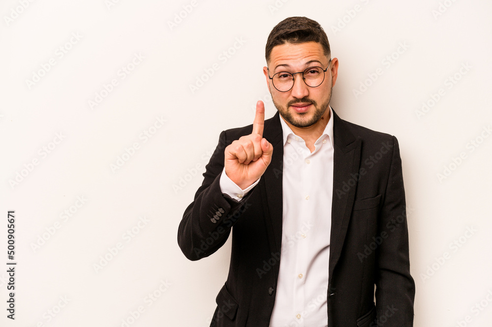 Business hispanic man isolated on white background showing number one with finger. Business hispanic man isolated on white background showing number one with finger.