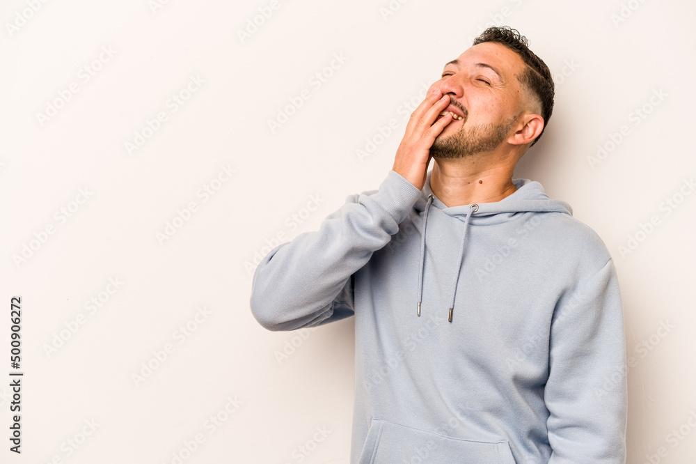 Young hispanic man isolated on white background laughing happy, carefree, natural emotion. Young hispanic man isolated on white background laughing happy, carefree, natural emotion.