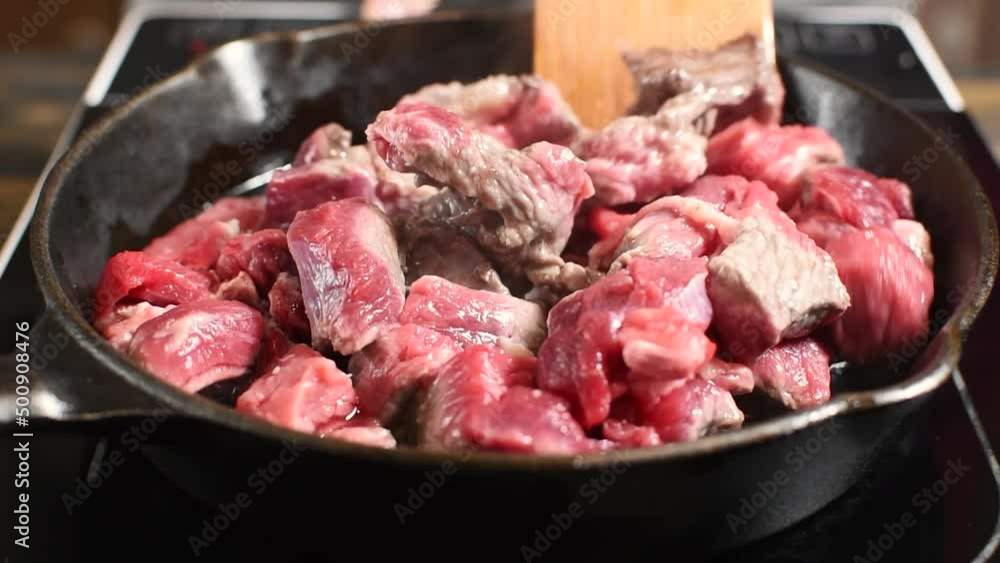 meet (beef) are fried in a frying pan meet (beef) are fried in a frying pan