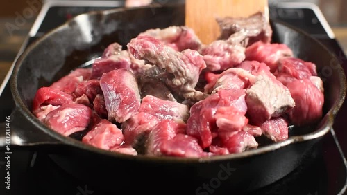 meet (beef) are fried in a frying pan