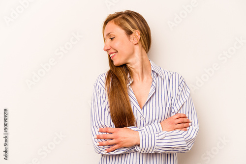 Young caucasian woman isolated on white background laughing and having fun.