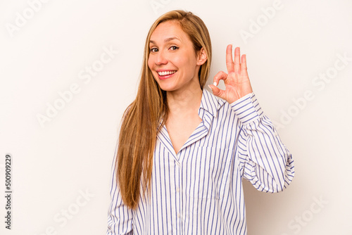 Wallpaper Mural Young caucasian woman isolated on white background cheerful and confident showing ok gesture. Torontodigital.ca