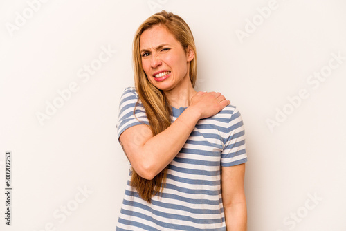 Young caucasian woman isolated on white background having a shoulder pain.