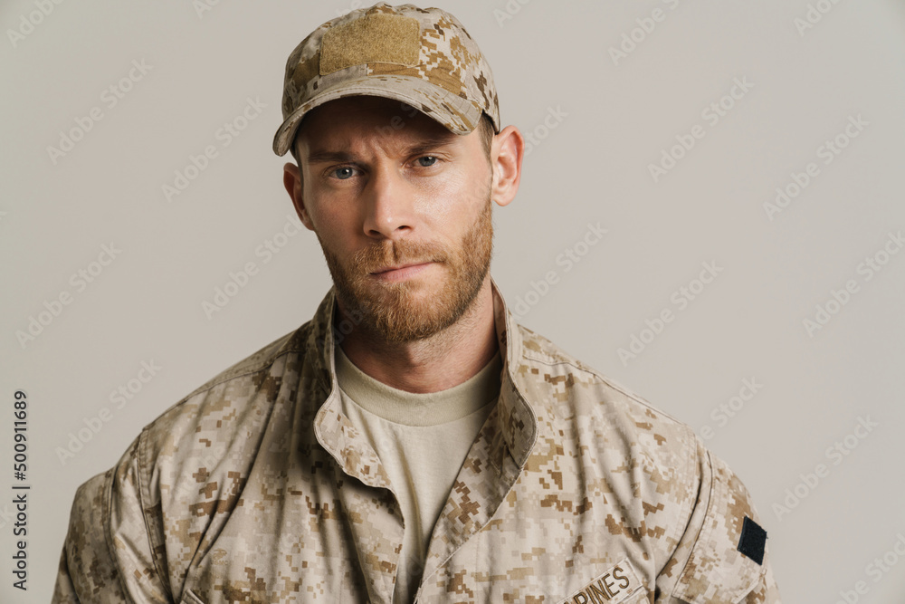 White military man wearing uniform posing and looking at camera White military man wearing uniform posing and looking at camera
