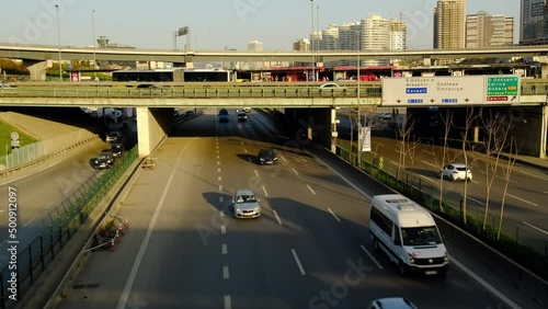 Wallpaper Mural Rush hour traffic in Istanbul Anatolian Side on D100 freeway. The Uzuncayir Metrobus Stop and modern skyscrapers of The Kadikoy Fikirtepe District are visible at the background. Torontodigital.ca