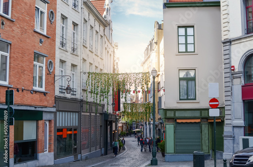 City street with beautiful buildings on sunny day