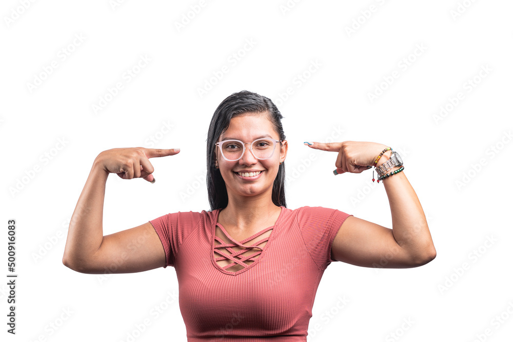Latina woman posing on a white background smiling and pointing to her glasses. Latina woman posing on a white background smiling and pointing to her glasses.