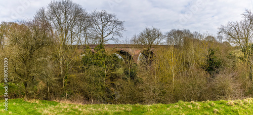 A view from the southern side of the abandoned Ingarsby Viaduct in Leicestershire, UK in early spring photo