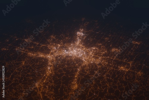 Aerial shot of Bologna (Italy) at night, view from south. Imitation of satellite view on modern city with street lights and glow effect. 3d render