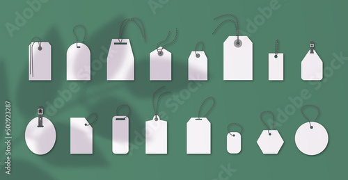 Set of luggage mockup tags isolated on emerald background with shadow plant overlay with string threads, round, square, custom, buckle.