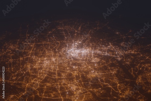Aerial shot of Guangzhou (China) at night, view from south. Imitation of satellite view on modern city with street lights and glow effect. 3d render
