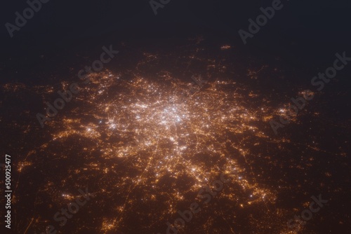 Fototapeta Naklejka Na Ścianę i Meble -  Aerial shot of Paris (France) at night, view from south. Imitation of satellite view on modern city with street lights and glow effect. 3d render