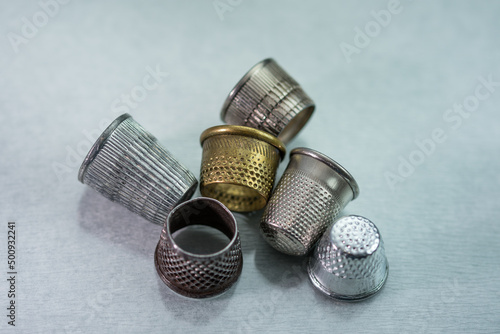 Obraz na plátně six old  and  new Tailoring thimble