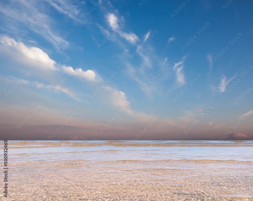 blue sea and cloudy pink sky panorama ,water wave on white sand at the tropical  beach summer holiday