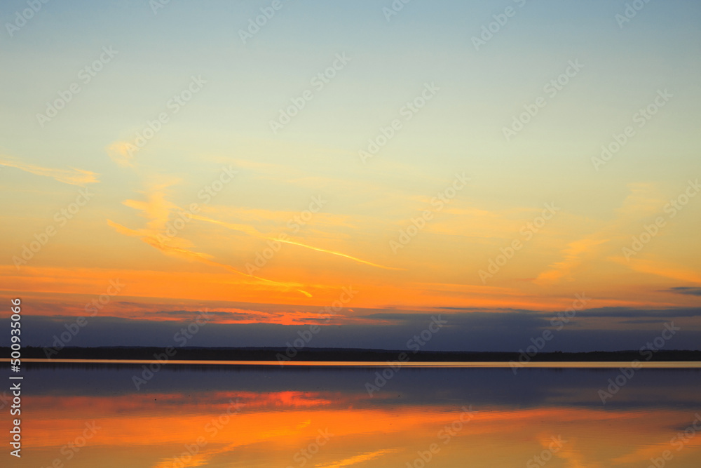 Reflection of a beautiful sunset over the water