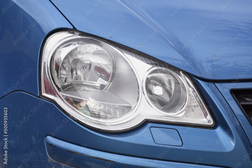Car's exterior details.Blue car - headlight on a blue  car